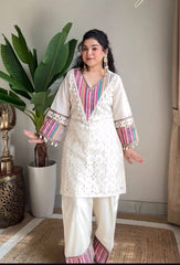 2-Piece Stylish Ensemble: Includes a well-fitted top and coordinated bottom Cord set